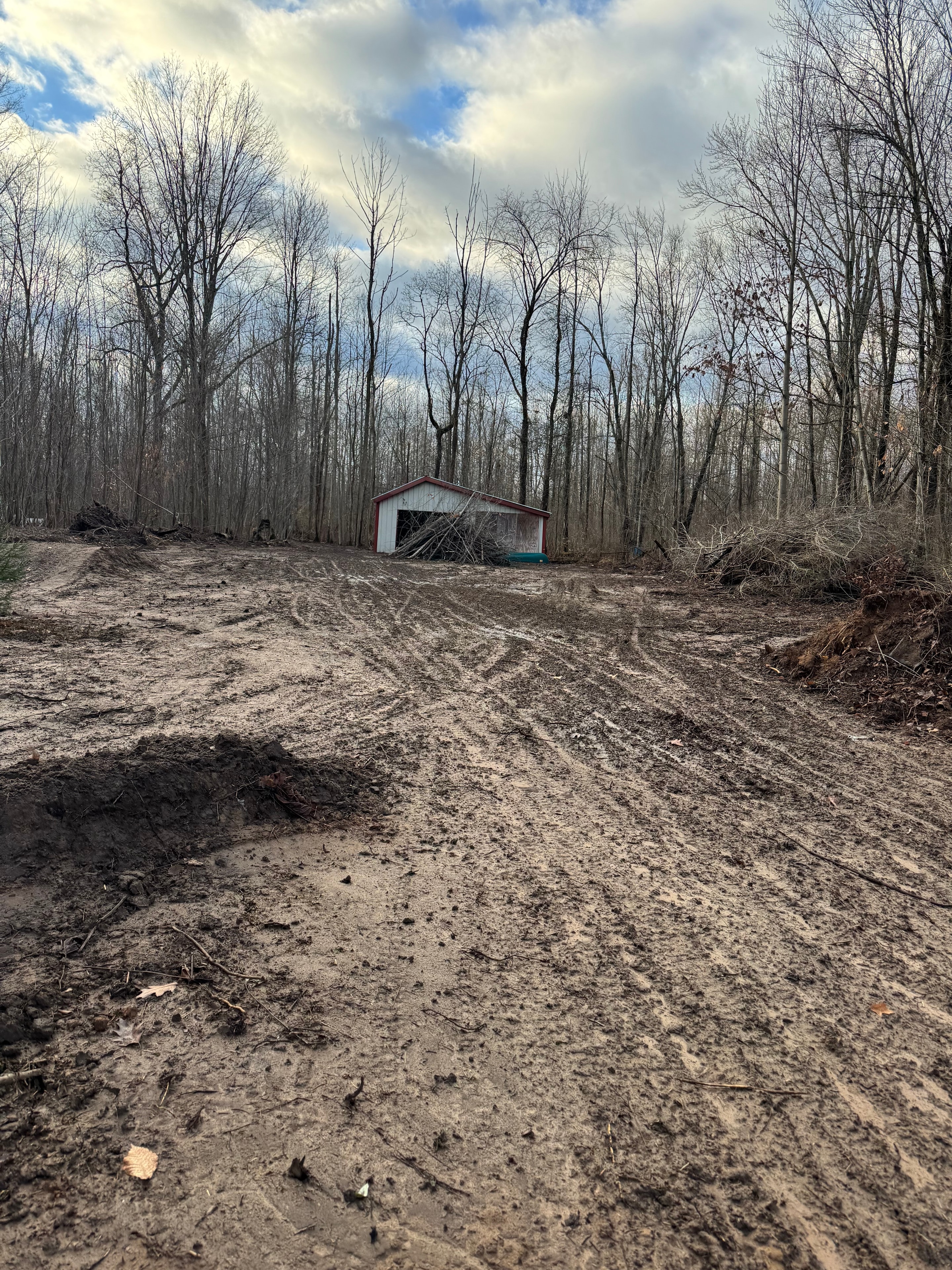 Cleared muddy lot ready for construction